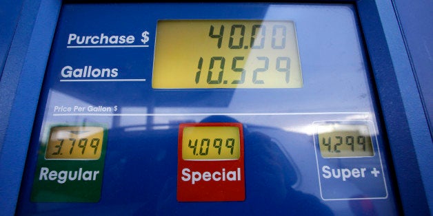 Gas prices are displayed at a Mobil gas station in Chicago, Thursday, Jan. 31, 2013. Gasoline prices are climbing as rising e