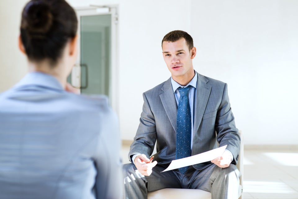 Candidate reached over and placed a hand on the interviewer's knee.