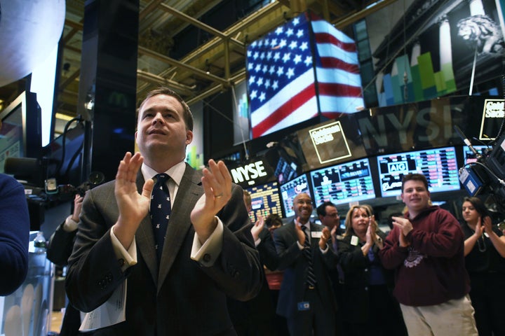 NEW YORK, NY - MARCH 25: Traders work the floor of the New York Stock Exchange during late trading on March 25, 2013 in New
