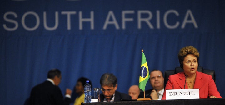 President of Brazil Dilma Rousseff , addresses the 5th Brics summit in Durban on March 27, 2013. Leaders from the BRICS group of emerging powers on Wednesday failed to launch a much-anticipated new development bank to rival Western-dominated institutions like the World Bank. AFP PHOTO / ALEXANDER JOE (Photo credit should read ALEXANDER JOE/AFP/Getty Images)