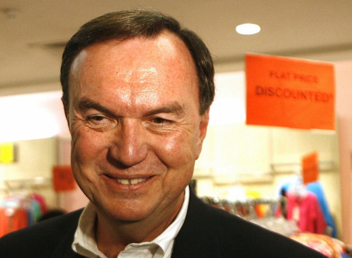 MUMBAI, INDIA: Vice-chairman of Wal-Mart stores, one of the world's largest retail chains, Mike Duke talks to the media during a walk-about in a mall in Mumbai, 22 February 2007. Duke and a four-member team toured several of India's retail shopping malls along Mumbai's northern suburbs, accompanied by high security. In hushed talks, he met officials of Bharti Enterprises, one of the country's top private telephone firms and with whom a preliminary deal was signed late 2006 to start a countrywide store chain run under a Wal-Mart franchise. AFP PHOTO/ Sajjad HUSSAIN (Photo credit should read SAJJAD HUSSAIN/AFP/Getty Images)