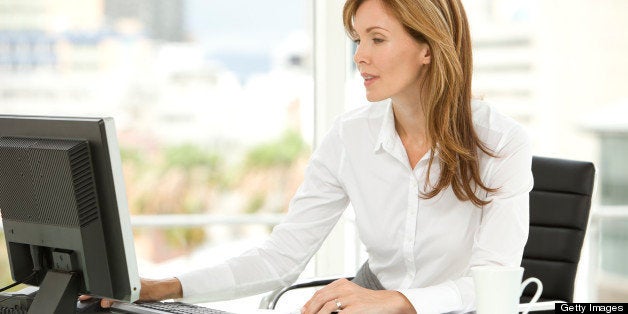 Beautiful businesswoman at workplace