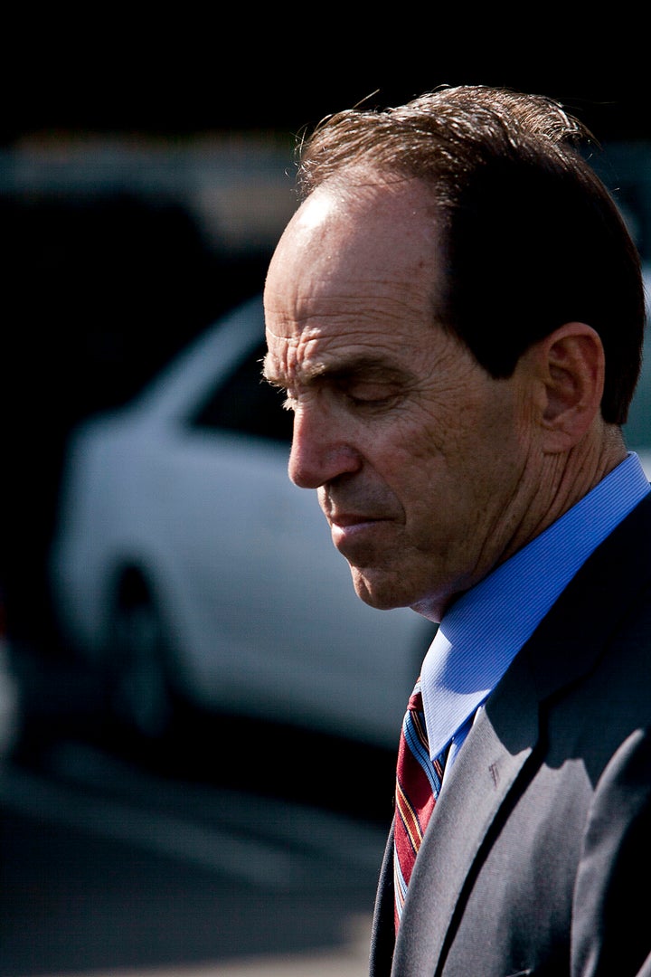 Scott London, the former KPMG LLP partner who led the firm?s audit practice in Los Angeles, exits federal court in Los Angeles, California, U.S., on Thursday, April 11, 2013. London was charged with passing inside tips about Herbalife Ltd. and Skechers USA Inc. in exchange for cash, jewelry and concert tickets. Photographer: Ted Soqui/Bloomberg via Getty Images 