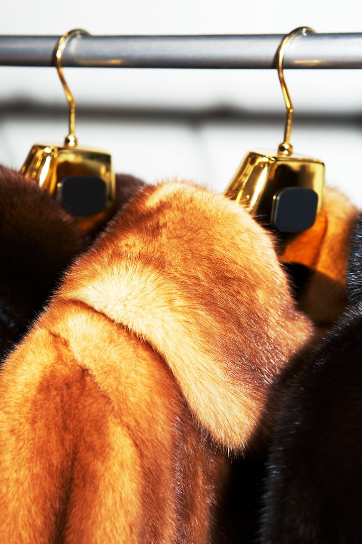 rich female fur coats on sale...