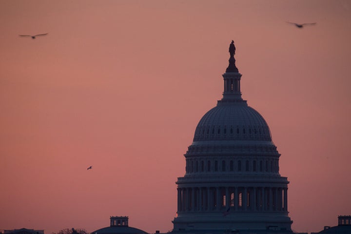 Birds fly around the U.S. Capitol in Washington, D.C., U.S., on Tuesday, April 9, 2013. Less than a week after job-creation f