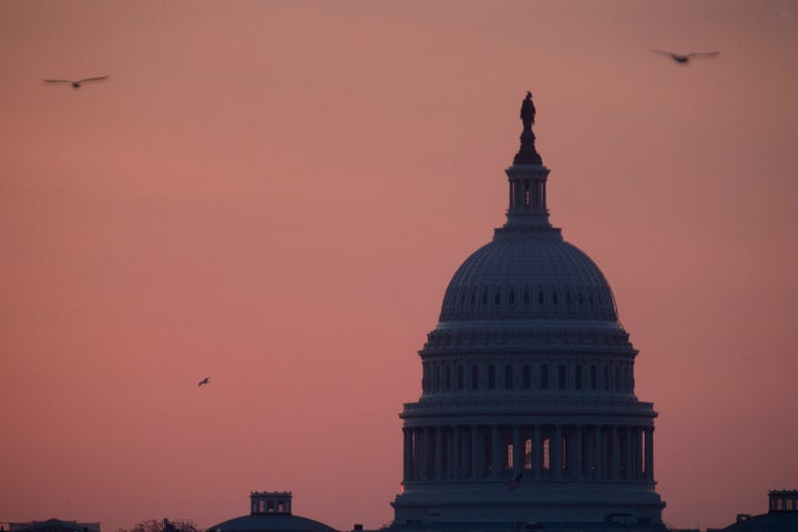 Birds fly around the U.S. Capitol in Washington, D.C., U.S., on Tuesday, April 9, 2013. Less than a week after job-creation figures fell short of expectations and underscored the U.S. economy's fragility, President Barack Obama will send Congress a budget that doesn't include the stimulus his allies say is needed and instead embraces cuts in an appeal to Republicans. Photographer: Andrew Harrer/Bloomberg via Getty Images