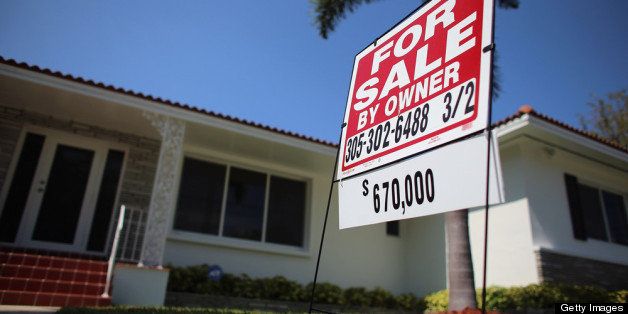 MIAMI, FL - MARCH 26: A for sale sign stands in front of a home on March 26, 2013 in Miami, Florida. A report released today by S&P Dow Jones Indices for its S&P/Case-Shiller Home Price Indices showed average home prices increased 7.3 percent for the 10-City Composite and 8.1 percent for the 20-City Composite in the 12 months ending in January 2013. (Photo by Joe Raedle/Getty Images)