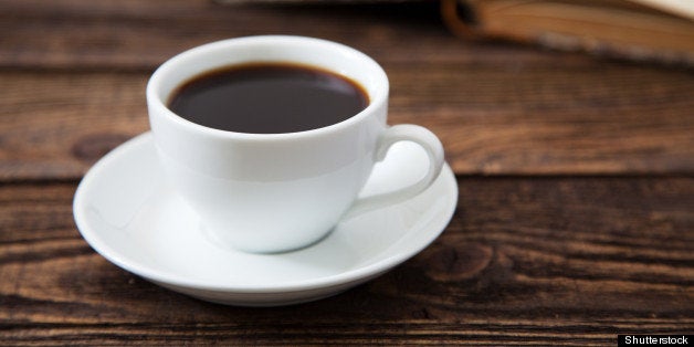 cup of coffee on a wooden table