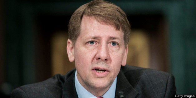 WASHINGTON, DC - MARCH 12: Richard Cordray, nominee for director of the Consumer Financial Protection Bureau, testifies at a confirmation hearing before the Senate Committee on Banking, Housing and Urban Affairs on March 12, 2013 in Washington, DC. Cordray testified that he doesn't see a 'one-size-fits-all solution' to financial challenges and stressed the importance of transparency in the bureau's work. (Photo by T.J. Kirkpatrick/Getty Images)