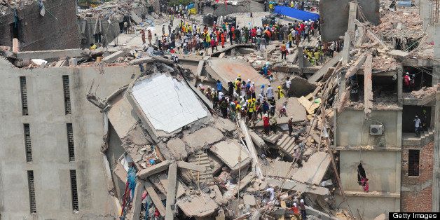 Bangladeshi volunteers and rescue workers are pictured at the scene after an eight-storey building collapsed in Savar, on the outskirts of Dhaka, on April 25, 2013. Survivors cried out to rescuers April 25 from the rubble of a block of garment factories in Bangladesh that collapsed killing 175 people, sparking criticism of their Western clients. AFP PHOTO/Munir uz ZAMAN (Photo credit should read MUNIR UZ ZAMAN/AFP/Getty Images)