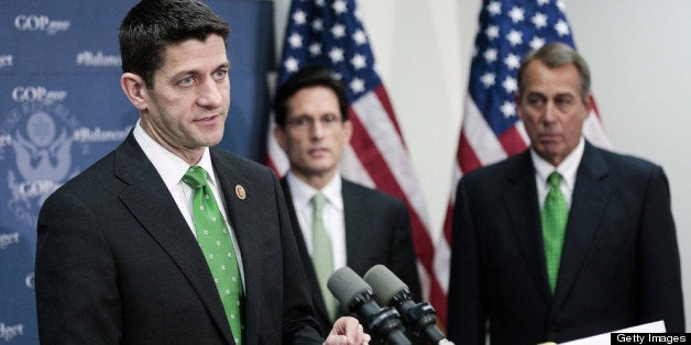 WASHINGTON, DC - MARCH 19: Rep. Paul Ryan (R-WI) (L) speaks about his new budget plan as House Republican leaders address the media after a party conference on March 19, 2013 in Washington, DC. GOP leaders asked that the president work with them to create a balanced budget plan, citing President Clinton's efforts to work with House Republicans on a budget in the 1990s. (Photo by T.J. Kirkpatrick/Getty Images)