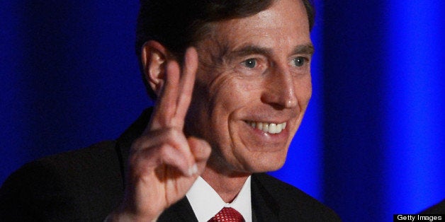 LOS ANGELES, CA - MARCH 26: Former CIA director and retired four-star general General David Petraeus applauds as he makes his first public speech since resigning as CIA director at University of Southern California dinner for students Veterans and ROTC students on March 26, 2013 in Los Angeles, California. Petraeus apologized in his speech for his actions that lead to him resigning from the CIA. (Photo by Kevork Djansezian/Getty Images)