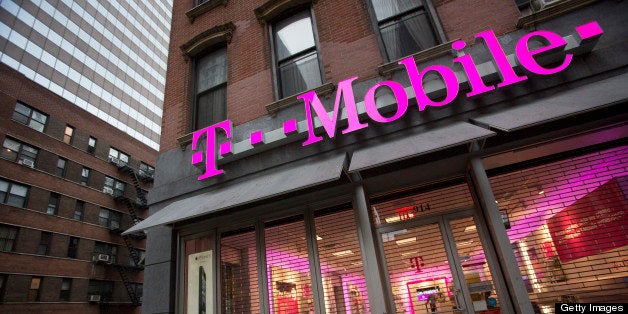 A T-Mobile USA Inc. retail location stands in New York, U.S., on Friday, April 12, 2013. T-Mobile USA Inc., the fourth-largest U.S. wireless carrier, will begin offering Apple Inc.'s iPhone for the first time today, providing the biggest showcase yet for its new installment-plan approach to selling phones. Photographer: Scott Eells/Bloomberg via Getty Images