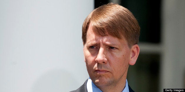Richard Cordray, former attorney general of Ohio, listens as U.S. President Barack Obama, unseen, nominates him to head the Consumer Financial Protection Bureau at the White House in Washington, D.C., U.S., on Monday, July 18, 2011. Obama said his nomination of Cordray to head the bureau puts financial lenders on notice that the government will be looking out for 'regular people.' Photographer: Joshua Roberts/Bloomberg via Getty Images