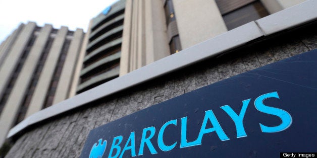 A sign sits outside the regional offices of Barclays Plc in Poole, U.K., on Wednesday, Dec. 12, 2012. Major international banks are looking to move more of their staff out of London to their regional offices in the future. Photographer: Chris Ratcliffe/Bloomberg via Getty Images