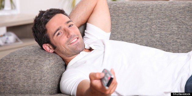 portrait of a man watching tv