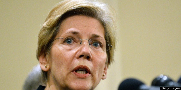 US Senator Elizabeth Warren ,D-MA, speaks at a press conference April 16, 2013 in Boston, Massachusetts, in the aftermath of two explosions that struck near the finish line of the Boston Marathon April 15. The number of casualties in a Monday's bombings at the Boston marathon has risen to 176, police said Tuesday. Three people were killed. AFP PHOTO/Stan HONDA (Photo credit should read STAN HONDA/AFP/Getty Images)