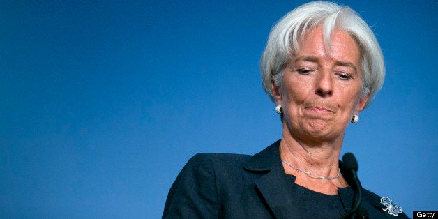Christine Lagarde, managing director of the International Monetary Fund (IMF), pauses while speaking at the Peterson Institute for International Economics in Washington, D.C., U.S., on Monday, Sept. 24, 2012. Lagarde urged European policy makers to implement their plans to save the euro, including the formation of a banking union, as the fund prepares to lower its global growth forecasts. Photographer: Andrew Harrer/Bloomberg via Getty Images