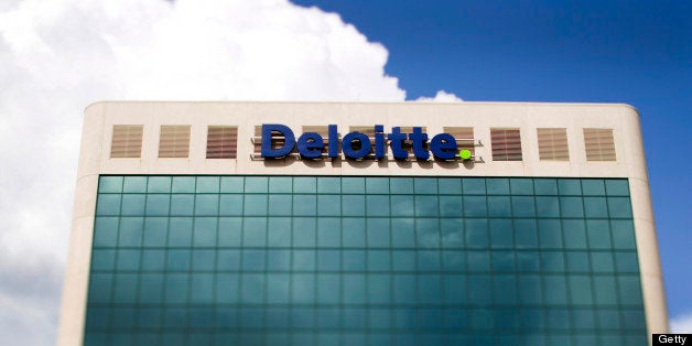 Signage is diplayed outside Deloitte Ltd. office in Ottawa, Ontario, Canada, on Wednesday, Aug. 10, 2011. Canada's trade deficit widened more than forecast in June, signaling that the economy may have stalled or even contracted in the second quarter. Photographer: Brent Lewin/Bloomberg via Getty Images