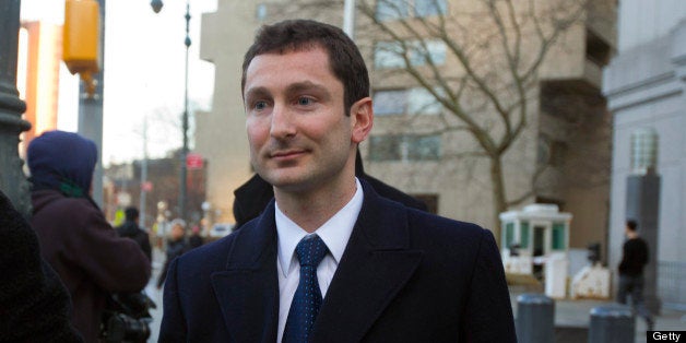 Fabrice Tourre, a trader with Goldman Sachs Group Inc., exits federal court after a hearing in New York, U.S., on Monday, Feb. 14, 2011. Tourre, the Goldman Sachs trader accused of misleading investors in a product linked to subprime mortgages, asked a federal judge to dismiss the U.S. Securities and Exchange Commission's lawsuit. Photographer: Jin Lee/Bloomberg via Getty Images