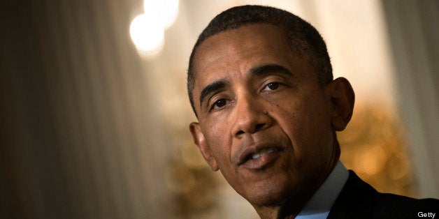 US President Barack Obama makes a statement in the State Dining Room of the White House July 17, 2013 in Washington, DC. Obam