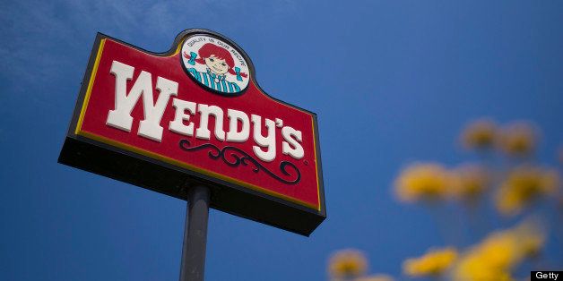Wendy's Co. signage is displayed outside of a restaurant in Daly City, California, U.S., on Tuesday, May 7, 2013. Wendy's Co. is expected to release earnings data on May 8. Photographer: David Paul Morris/Bloomberg via Getty Images