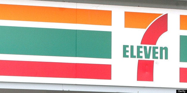 CHICAGO - AUGUST 12: A man leaves a franchised 7-Eleven store past cigarette ads posted on the door August 12, 2005 in Chicago, Illinois. It has been reported that the Dallas, Texas based 7-Eleven has signed an agreement regarding the marketing and sale of tobacco products in its convenience stores in 40 states, including Illinois. In the agreement, 7-Eleven agreed to toughen it's procedures aimed at catching underage shoppers trying to buy tobacco products, remove outward facing tobacco signs near playgrounds and schools, ban tobacco vending machines and will not place tobacco signs next to products popular to minors. 7-Eleven is the largest retailer of tobacco products in the nation. (Photo by Tim Boyle/Getty Images)