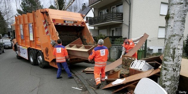 GERMANY - MARCH 01: GERMANY, BONN, bulky waste being collected from garbage collectors with a garbage truck. (Photo by Ulrich Baumgarten via Getty Images)