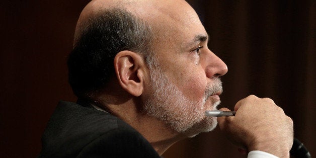 WASHINGTON, DC - JULY 18: Federal Reserve Board Chairman Ben Bernanke testifies before the Senate Banking, Housing and Urban Affairs Committee July 18, 2013 in Washington, DC. Bernanke testified on the semi-annual monetary policy report to Congress (Photo by Win McNamee/Getty Images)