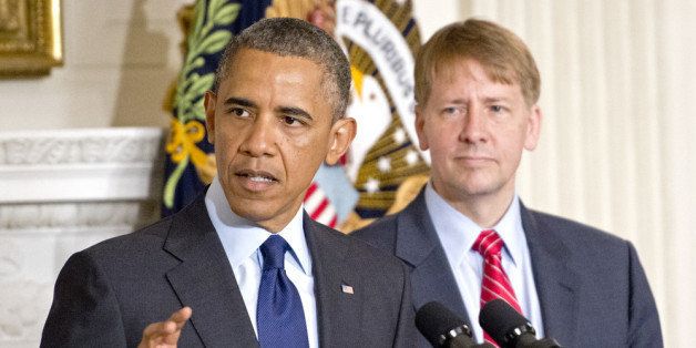 WASHINGTON, DC - JULY 17: (AFP OUT) U.S. President Barack Obama delivers a statement on the confirmation of Richard Cordray (R) as Director of the Consumer Financial Protection Bureau in the State Dining Room of the White House July 17, 2013 in Washington, DC. Previously, Cordray was Attorney General of Ohio. (Photo by Ron Sachs-Pool/Getty Images)