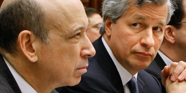 WASHINGTON - FEBRUARY 11: Executives from the financial institutions who received TARP funds, (L-R) Goldman Sachs Chairman and CEO Lloyd Blankfein, JPMorgan Chase & Co CEO and Chairman Jamie Dimon, The Bank of New York Mellon CEO Robert P. Kelly, Bank of America CEO Ken Lewis, State Street Corporation CEO and Chairman Ronald Logue, Citigroup CEO Vikram Pandit, Wells Fargo President and CEO John Stumpf testify before the House Financial Services Committee February 11, 2009 in Washington, DC. The hearing focused on how financial institutions have spent funds received from the Troubled Asset Relief Program (TARP). (Photo by Chip Somodevilla/Getty Images)