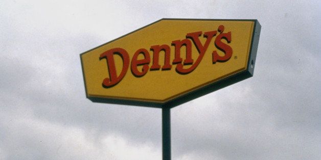 Denny's restaurant sign, re 1993 class-action suit against chain's W. Coast outlets for discriminatory practices against black customers & employees. (Photo by Robert Landau//Time Life Pictures/Getty Images)