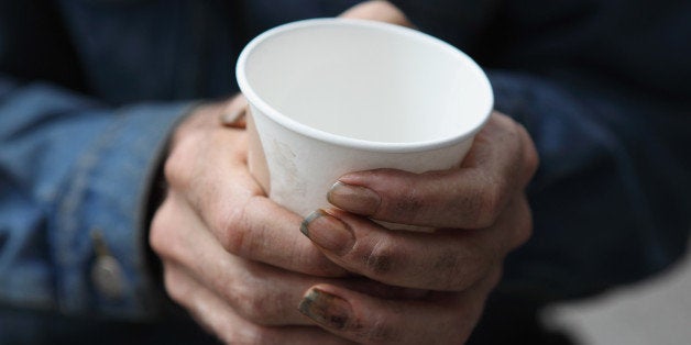 SAN FRANCISCO - SEPTEMBER 16: A homeless man holds a cup as he begs panhandles for spare change on September 16, 2010 in San Francisco, California. The U.S. poverty rate increased to a 14.3 percent in 2009, the highest level since 1994. (Photo by Justin Sullivan/Getty Images)