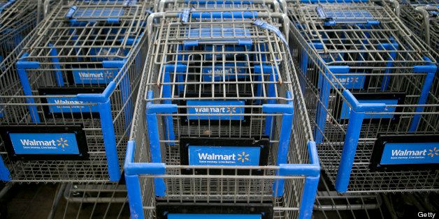 Shopping carts sit inside a Wal-Mart store in Alexandria, Virginia, U.S., on Wednesday, Nov. 14, 2012. Wal-Mart Stores Inc. is scheduled to release earnings data on Nov. 15. Photographer: Andrew Harrer/Bloomberg via Getty Images