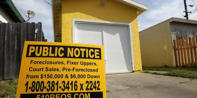 RICHMOND, CA - APRIL 15: A sign is posted in front of a foreclosed home April 15, 2010 in Richmond, California. Home foreclosure notices surged nearly 19 percent in March with 367,056 residential properties defaulting on loans, the highest monthly total since 2005. (Photo by Justin Sullivan/Getty Images)