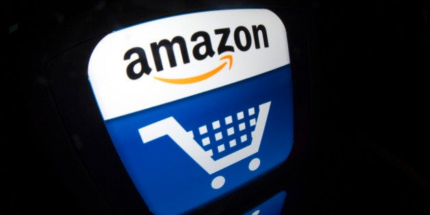 A picture shows an Ipad with an 'Amazon' logo on November 13, 2012 in Paris. French tax authorities have demanded $252 million in back taxes and interest from online retailer Amazon, according to a company document on November 13, 2012.AFP PHOTO / LIONEL BONAVENTURE (Photo credit should read LIONEL BONAVENTURE/AFP/Getty Images)