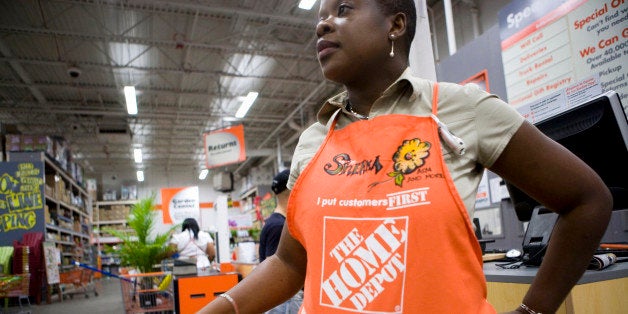 Sherma Chambers, assistant store manager, works at a Home Depot store in the Brooklyn borough of New York, U.S., on Thursday, April 8, 2010. Home Depot Inc., the largest U.S. home-improvement retailer, is adding store jobs for the first time in four years in anticipation of a rebound in sales. Photographer: Ramin Talaie/Bloomberg via Getty Images