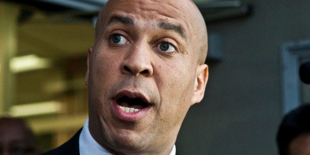 NEWARK, NJ - AUGUST 13: Newark Mayor and Senate candidate Cory Booker speaks with members of the media at a polling center on August 13, 2013 in Newark, New Jersey. Voters go to the polls for the special-election primary in which Booker holds a commanding lead among Democrats. (Photo by Kena Betancur/Getty Images)