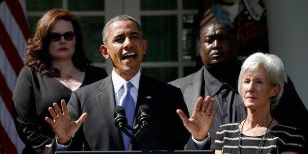 WASHINGTON, DC - OCTOBER 01: U.S. President Barack Obama delivers remarks about the launch of the Affordable Care Act's health insurance marketplaces and the first federal government shutdown in 17 years as he's joined by U.S. Health and Human Services Secretary Kathleen Sebelius (R) and Americans who will benefit from the Affordable Care Act in the Rose Garden of the White House October 1, 2013 in Washington, DC. House Republicans and Senate Democrats continue to volley legislation back and forth as they battle over a budget to keep the government running and delaying or defunding 'Obamacare.' (Photo by Win McNamee/Getty Images)