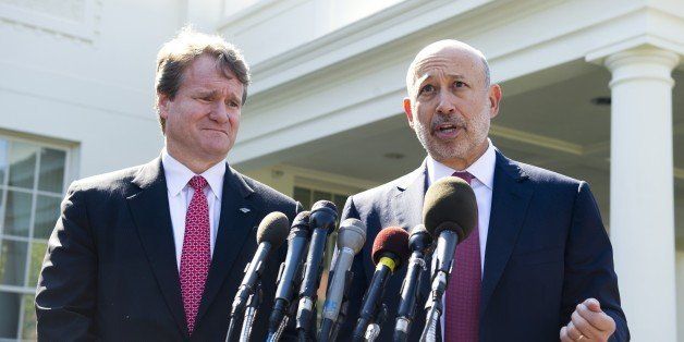 Lloyd Blankfein (R), Chairman and CEO of Goldman Sachs, and Brian Moynihan (L), CEO of Bank of America, speak to the media after attending a meeting of the Financial Services Forum with US President Barack Obama at the White House in Washington, DC, October 2, 2013, on the second day of the government shutdown. AFP PHOTO / Saul LOEB (Photo credit should read SAUL LOEB/AFP/Getty Images)