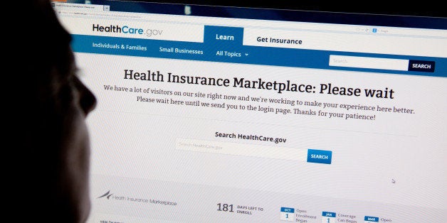 A woman looks at the HealthCare.gov insurance exchange internet site October 1, 2013 in Washington, DC. US President Barack Obama's Affordable Care Act, or Obamacare as it is commonly called, passed in March 2010, went into effect Tuesday at 8am EST. Heavy Internet traffic and system problems plagued the launch of the new health insurance exchanges Tuesday morning. Consumers attempting to log on were met with an error message early Tuesday due to an overload of Internet traffic. AFP PHOTO / Karen BLEIER (Photo credit should read KAREN BLEIER/AFP/Getty Images)