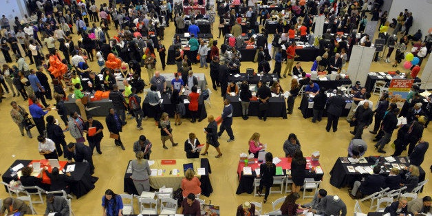 FORT WASHINGTON, MD - SEPTEMBER 17: Thousands of applicants attend a job fair hosted by Tanger Outlets for its November opening on Tuesday, September 17, 2013, in Fort Washington, MD. The center at National Harbor will bring 900 jobs to Prince George's County. Event organizers said the job fair attracted roughly 1,000 applicants per hour and they are expecting to receive about 6-7,000 applicants by day's end. (Photo by Jahi Chikwendiu/The Washington Post via Getty Images)