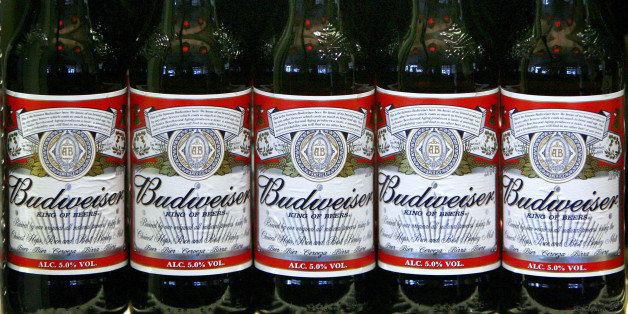UNITED KINGDOM - JUNE 27: Bottles of Budweiser beer sit on a cooler shelf at a pub in Hornchurch, Essex, on Friday, June 27, 2008. Inbev NV, the Belgian brewer pursuing a takeover of Anheuser-Busch Cos., may have to offer an additional $7 billion to persuade the U.S. company's board to sell. (Photo by Chris Ratcliffe/Bloomberg via Getty Images)