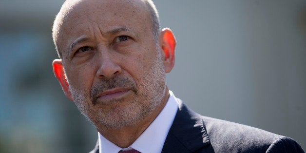 Lloyd Blankfein, chief executive officer of Goldman Sachs Group Inc., listens to a question during a news conference after a