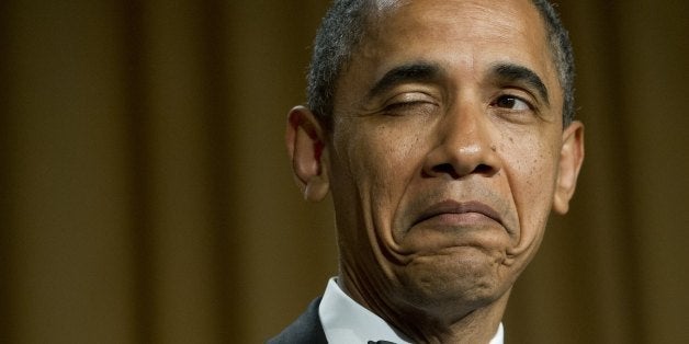 US President Barack Obama winks as he tells a joke about his place of birth during the White House Correspondents Association Dinner in Washington, DC, April 28, 2012. The annual event, which brings together US President Barack Obama, Hollywood celebrities, news media personalities and Washington correspondents, features comedian Jimmy Kimmel as the host. AFP PHOTO / Saul LOEB (Photo credit should read SAUL LOEB/AFP/GettyImages)