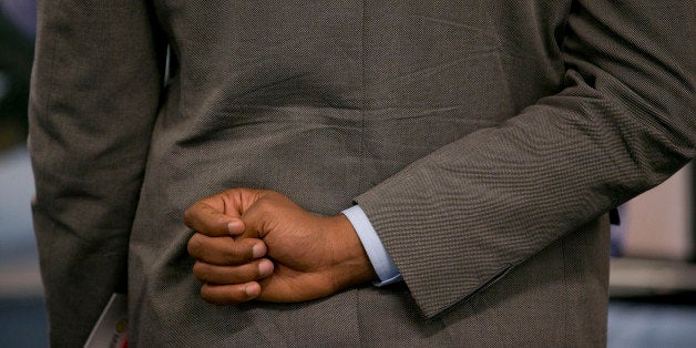 A job seeker talks to a job recruiter at the Black Data Processing Associates (BDPA) career fair in Washington, D.C., U.S., o