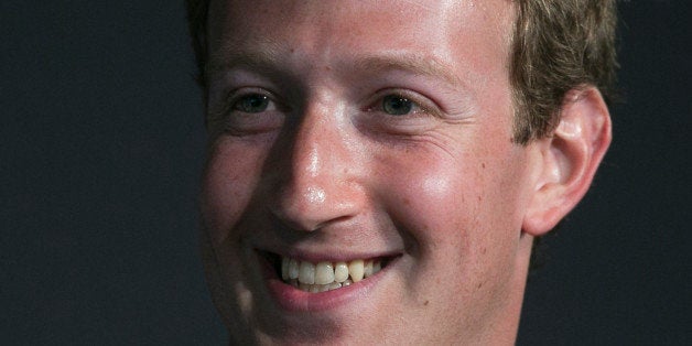 Mark Zuckerberg, founder and chief executive officer of Facebook Inc., smiles during an interview at the Newseum in Washington, D.C., U.S., on Wednesday, Sept. 18, 2013. Zuckerberg said helping 11 million undocumented U.S. residents is the most important aspect of immigration issues he's exploring with congressional leaders during a Washington visit. Photographer: Andrew Harrer/Bloomberg via Getty Images 