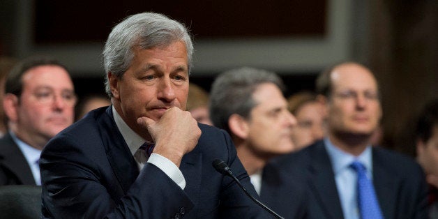 UNITED STATES - JUNE 13: Jamie Dimon, chairman of the board, president and CEO of JPMorgan Chase, prepares to testify at a S