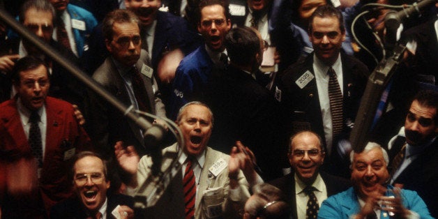 347769 09: Traders on the floor of the New York Stock Exchange cheer after the Dow Jones Industrial Average surpassed 10,000 for the first time March 16, 1999 in New York City. The Industrial Average reached the milestone then dropped but economists say its a sign of a healthy economy and the market will continue at a record-setting pace. (Photo by Porter Gifford/Liaison)