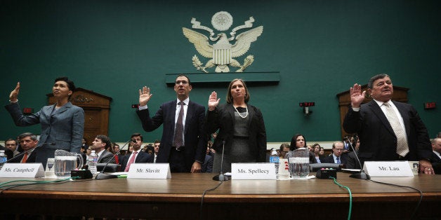 WASHINGTON, DC - OCTOBER 24: (L-R) Senior vice president of CGI Federal Cheryl Campbell, group executive vice president for Optum/QSSI Andrew Slavitt, corporate counsel for Equifax Workforce Solutions Lynn Spellecy, and program director for Serco John Lau are sworn in during a hearing on implementation of the Affordable Care Act before the House Energy and Commerce Committee October 24, 2013 on Capitol Hill in Washington, DC. Developers who helped to build the website for people to buy health insurance under Obamacare testified before the panel on what had gone wrong to cause the technical difficulties in accessing the site. (Photo by Alex Wong/Getty Images)